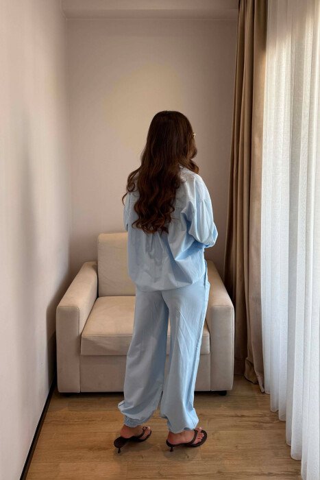 SET NJE NGJYRESH KEMISHE + PANTALLONA PER FEMRA NE NGJYRE BLU TE ZBARDHUR - 4