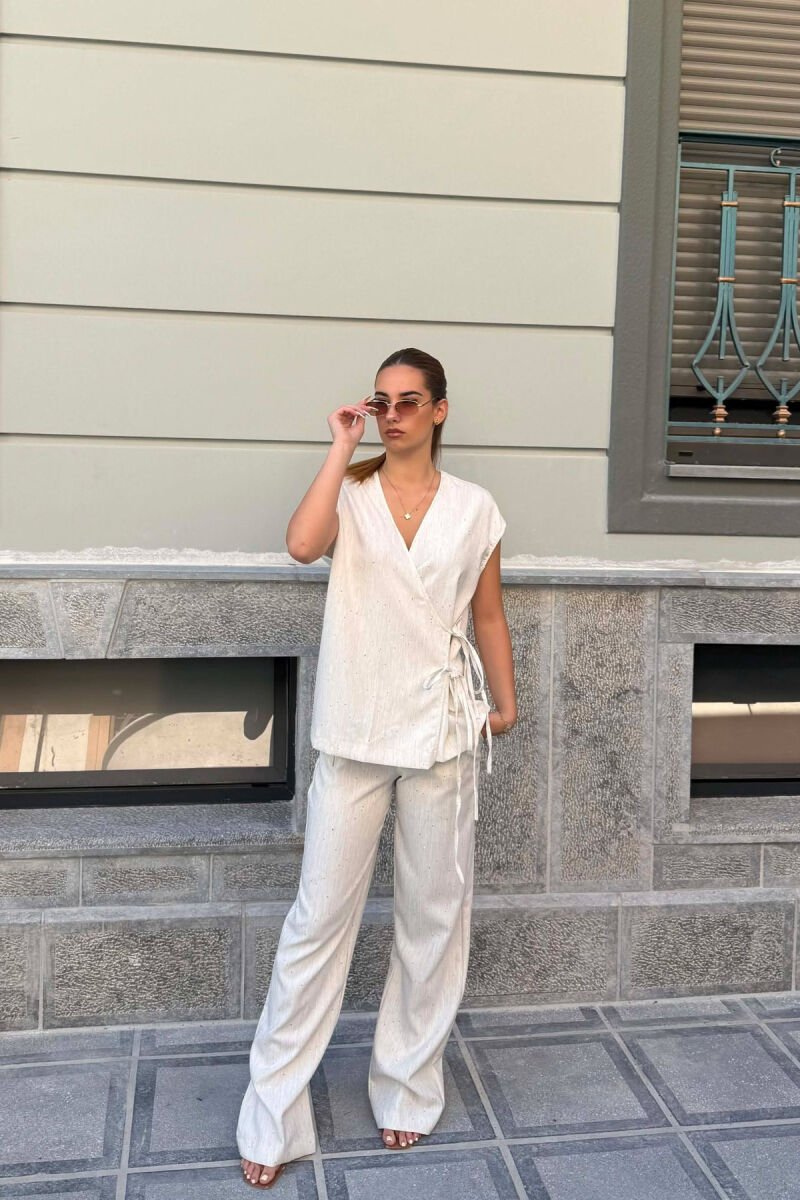 SET NJE NGJYRESH LEKURE JELEK+ + PANTALLONA PER FEMRA NE NGJYRE KREM - 1