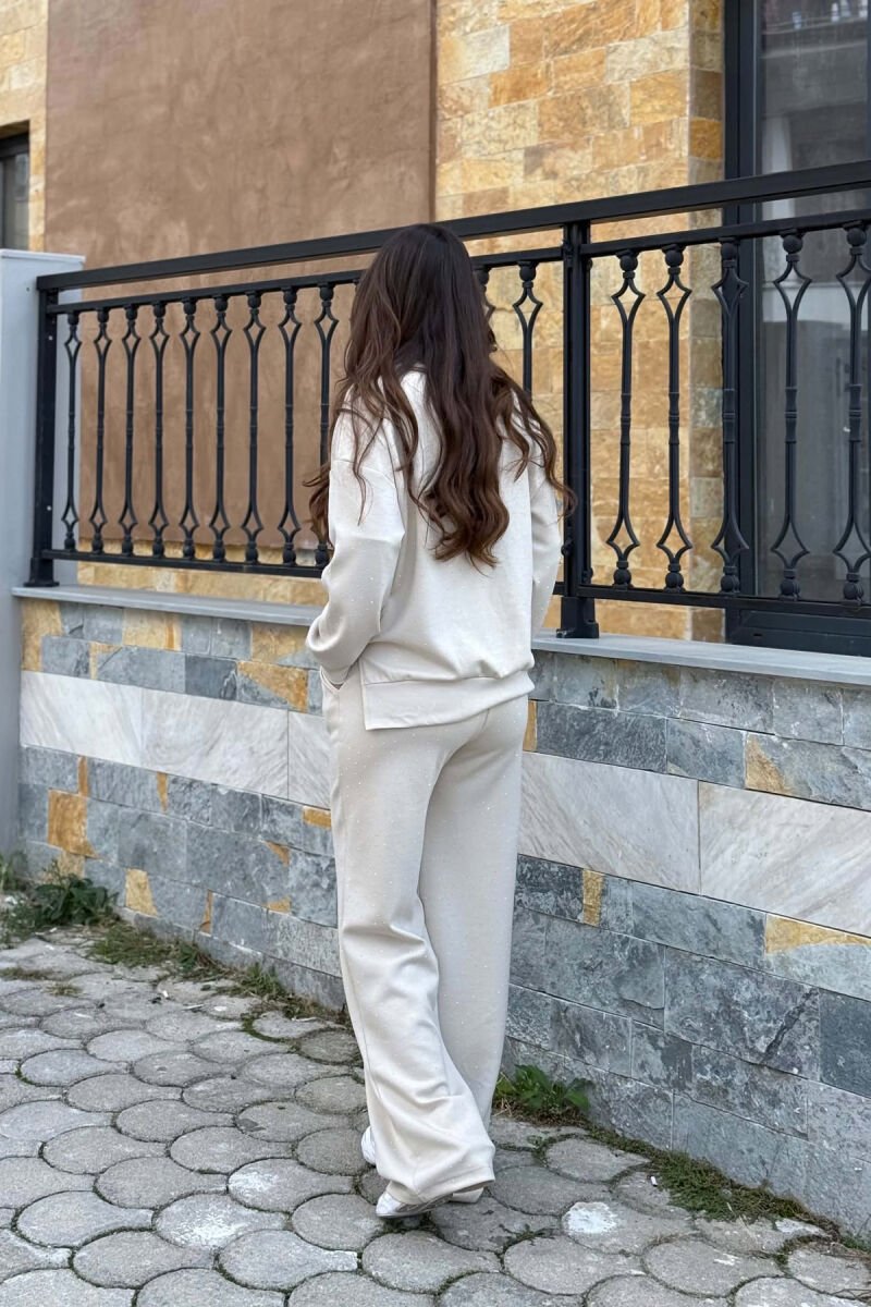 SET NJE NGJYRESH ME DETAJE ME SHKELQIM BLUZE + PANTALLONA PER FEMRA NE NGJYRE BEZHE - 4
