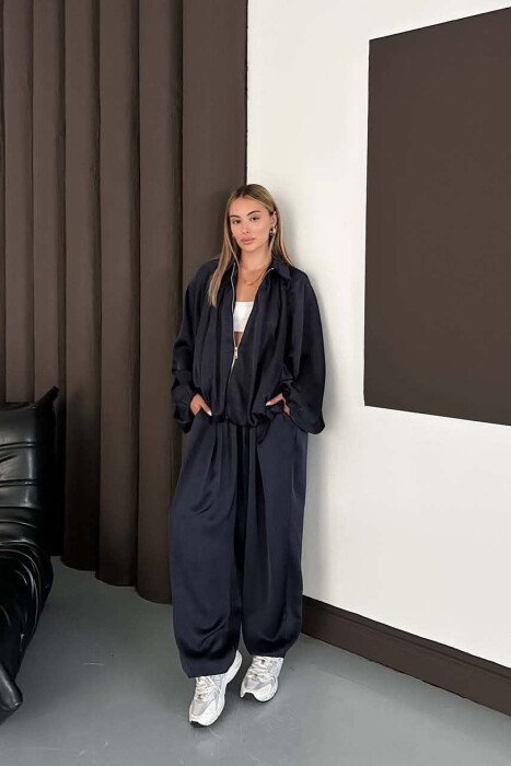 SET NJE NGJYRESH ME SHKELQIM XHAKETE + PANTALONA TE GJERA PER FEMRA NE NGJYRE BLU - 1