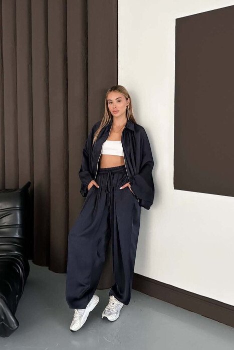 SET NJE NGJYRESH ME SHKELQIM XHAKETE + PANTALONA TE GJERA PER FEMRA NE NGJYRE BLU - 8