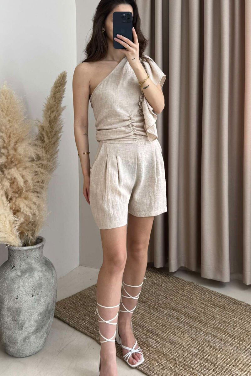 SET NJË NGJYRËSH PËR FEMRA CROP+PANTALLONA TË SHKURTRA NË NGJYRË BEZHË - 1