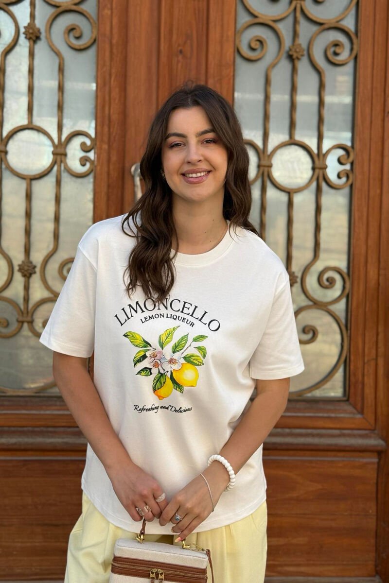T-SHIRT ME DIZAJNIN E LIMONAVE PËR FEMRA NË NGJYRËN E BARDHË - 1