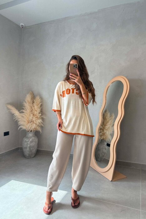 T-SHIRT ME SHKRIME NE PJESEN PARA PER FEMRA NE NGJYRE KREM - 4
