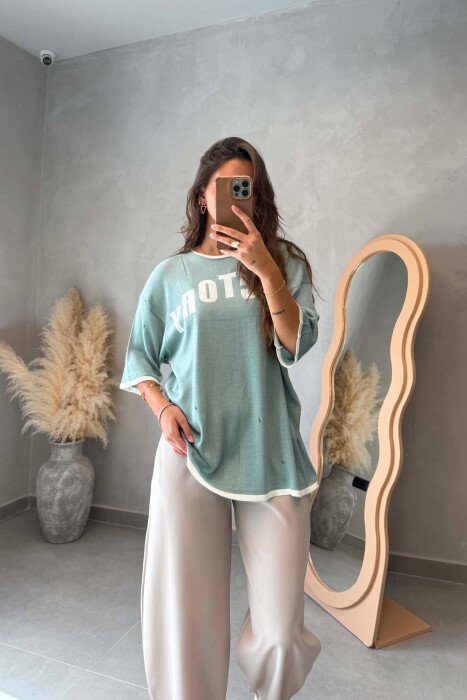 T-SHIRT ME SHKRIME NE PJESEN PARA PER FEMRA NE NGJYRE MENTE - 1