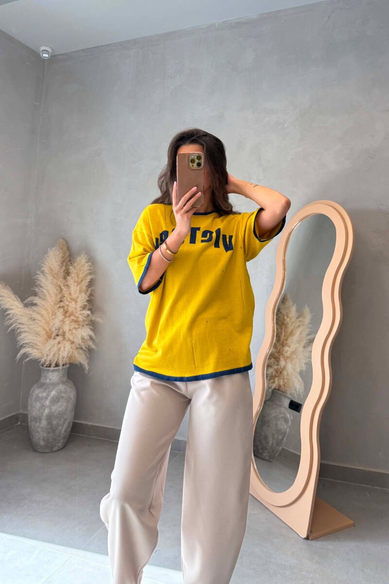 T-SHIRT ME SHKRIME NE PJESEN PARA PER FEMRA NE NGJYRE TE VERDHE - 3