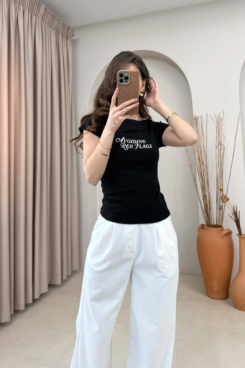 T-SHIRT ME SHKRIME PER FEMRA NE NGJYRE TE ZEZE - 2
