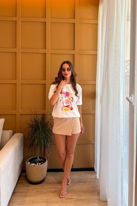 T-SHIRT NJE NGJYRESH ME IMAZH NE PJESEN PARA PER FEMRA NE NGJYRE TE BARDHE - 3