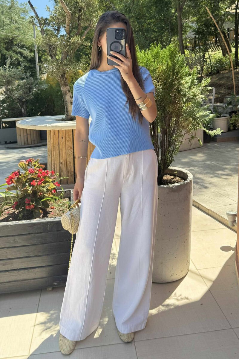 T-SHIRT NJE NGJYRESH ME JAKE TE RRUMBULLAKET PER FEMRA NE NGJYRE BLU TE ZBARDHUR - 1