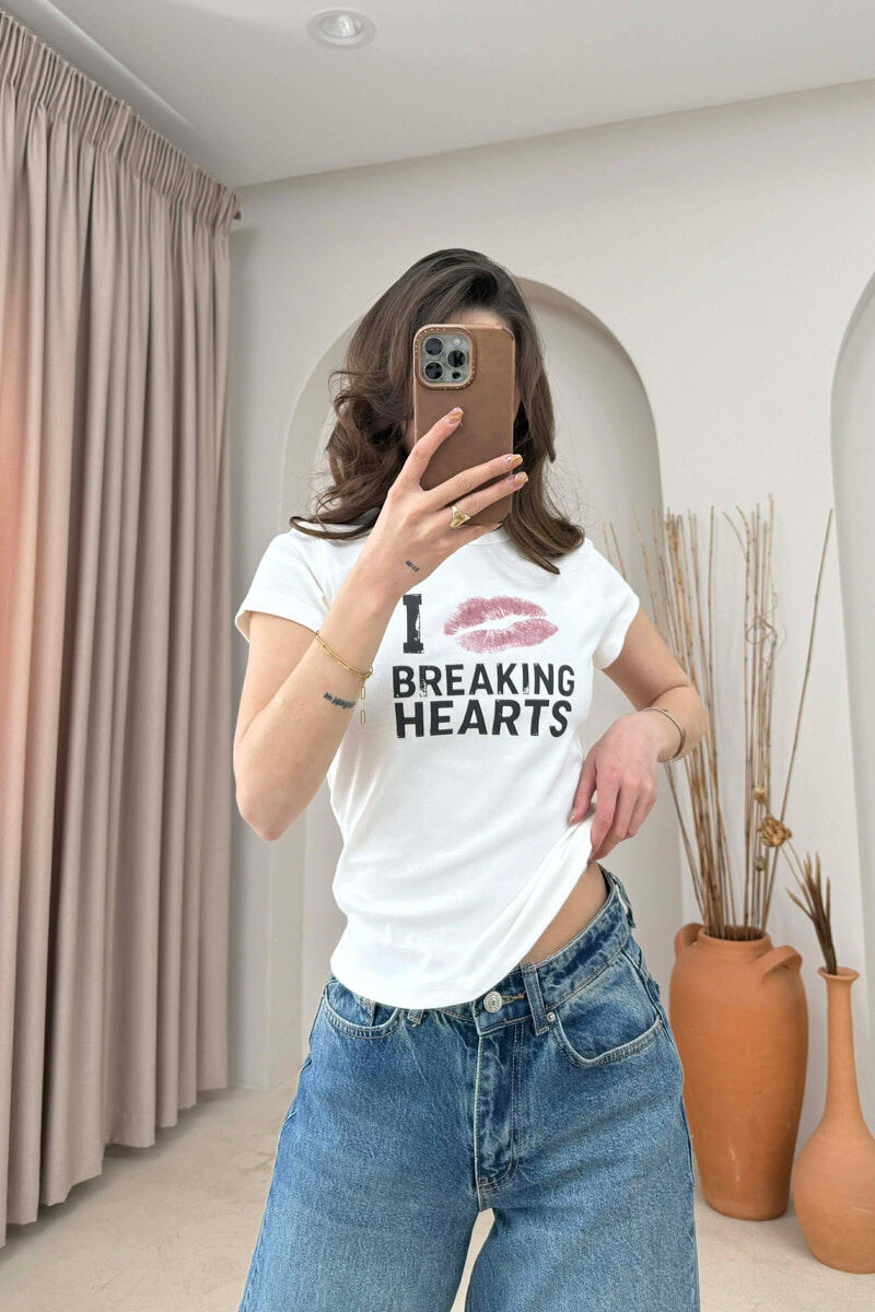 T-SHIRT NJE NJE NGJYRESH PER FEMRA NE NGJYRE TE BARDHE - 1
