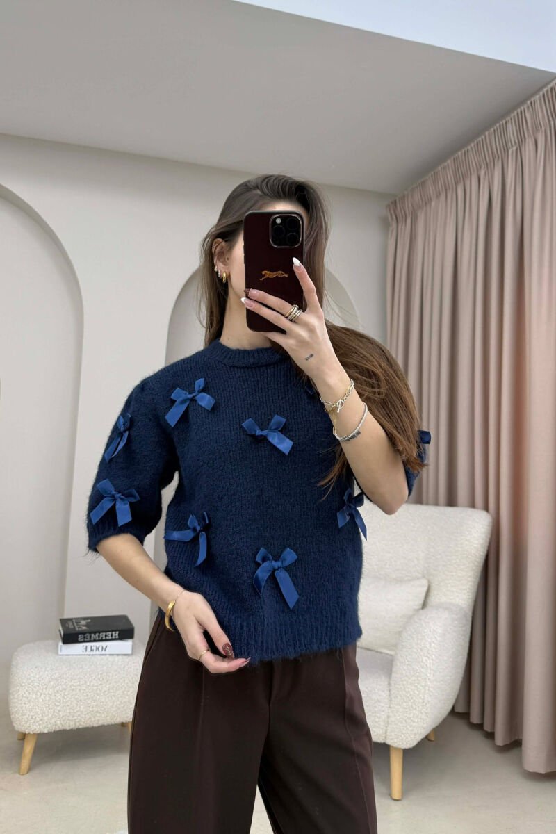 TRIKO ME MENGE TE SHKURTA DHE DETAJE FJONGOSH PER FEMRA NE NGJYRE BLU TE ERRET - 1