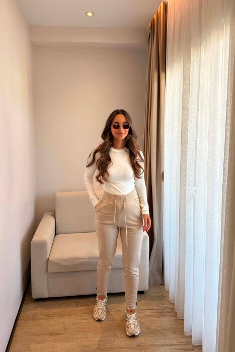 TUTA NJE NGJYRESHE ME BEL ELASTIK PER FEMRA NE NGJYRE BEZHE - KLAUDIO FASHION