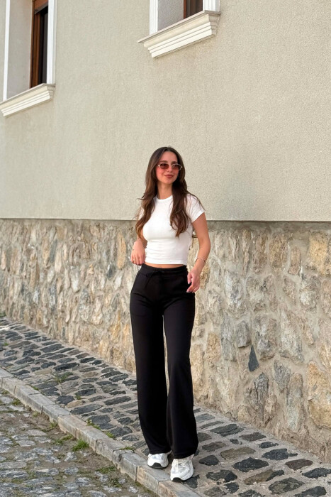 TUTA TË GJERA NJË NGJYRËSHE PËR FEMRA NË NGJYRËN E ZEZË - KLAUDIO FASHION