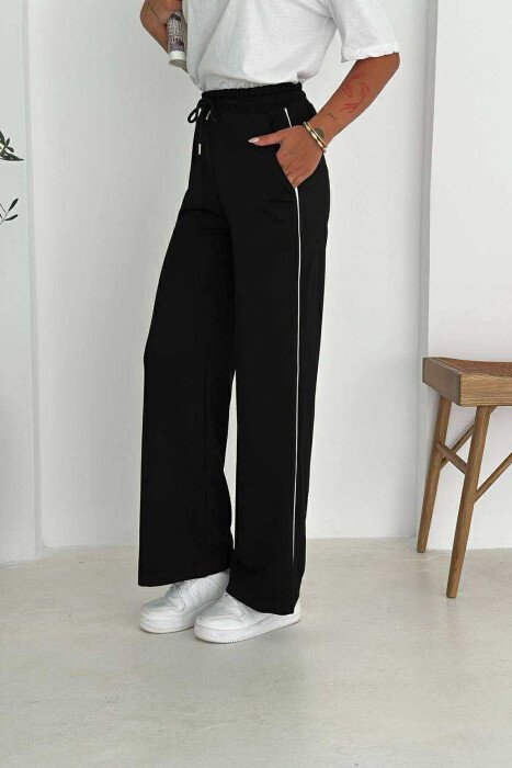 TUTA TË THJESHTA NJË NGJYRËSHE ELASTIKE PËR FEMRA NË NGJYRË TË ZEZË - 1