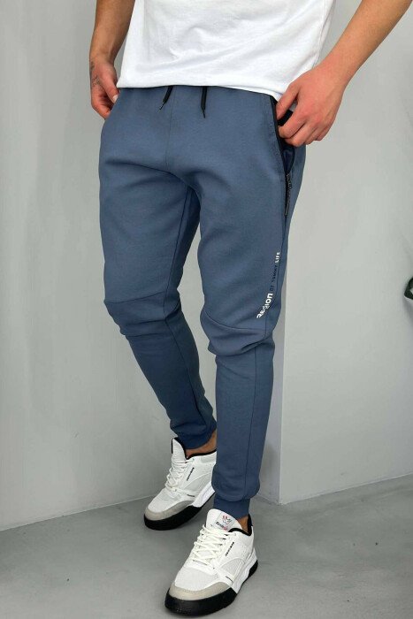 TUTA PËR MESHKUJ ME XHEPA ME ZINXHIRË NË NGJYRËN BLU - KLAUDIO FASHION